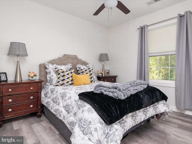 7802 Gary Ln, Severn, MD 21144 - bedroom featuring wood finished floors and a ceiling fan