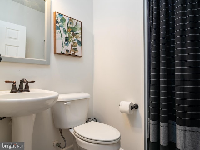 7802 Gary Ln, Severn, MD 21144 - full bathroom with toilet and curtained shower