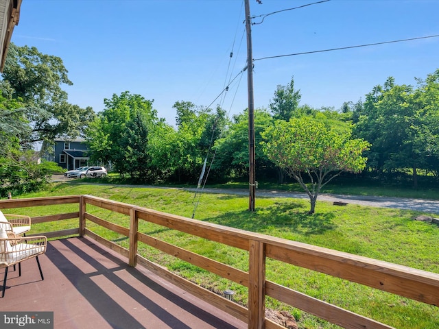 7802 Gary Ln, Severn, MD 21144 - wooden deck featuring a lawn