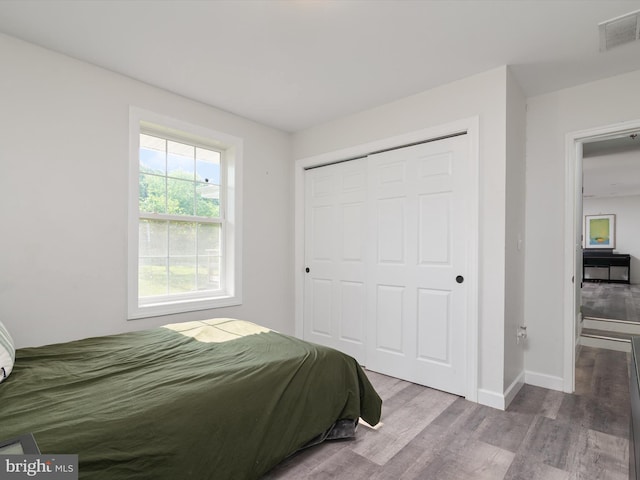 7802 Gary Ln, Severn, MD 21144 - bedroom featuring wood finished floors and a closet