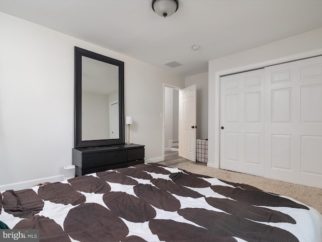 7802 Gary Ln, Severn, MD 21144 - bedroom featuring a closet and carpet
