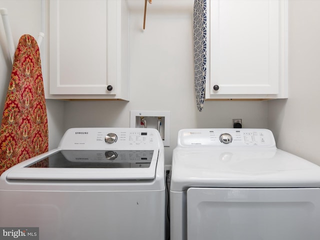 7802 Gary Ln, Severn, MD 21144 - laundry room with washer and dryer and cabinet space