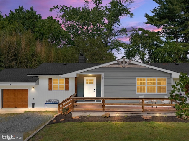 7802 Gary Ln, Severn, MD 21144 - single story home featuring an attached garage, a chimney, gravel driveway, a front lawn, and a shingled roof