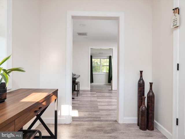 7802 Gary Ln, Severn, MD 21144 - hallway featuring light wood-type flooring and baseboards
