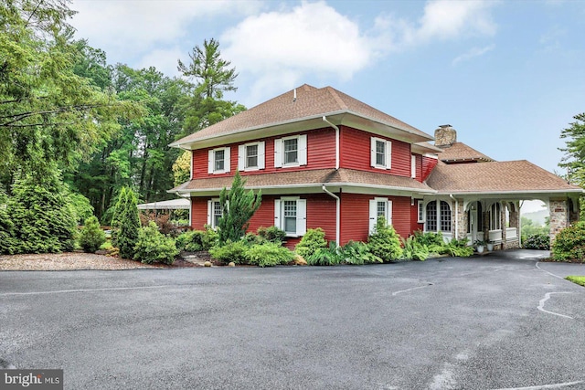 2165 Broadway, Hanover, PA 17331 - view of front facade featuring a chimney, roof with shingles, and a porch