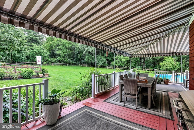 2165 Broadway, Hanover, PA 17331 - deck with outdoor dining area, a fenced backyard, and a forest view