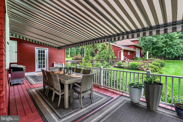 2165 Broadway, Hanover, PA 17331 - wooden deck with outdoor dining area, a lawn, and area for grilling