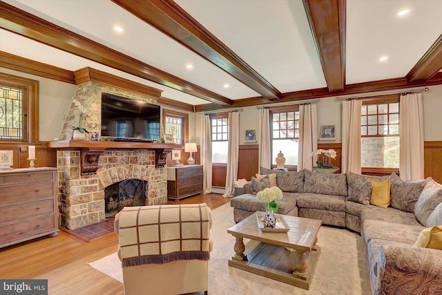 2165 Broadway, Hanover, PA 17331 - living room featuring ornamental molding, a fireplace, beam ceiling, wainscoting, and wood finished floors