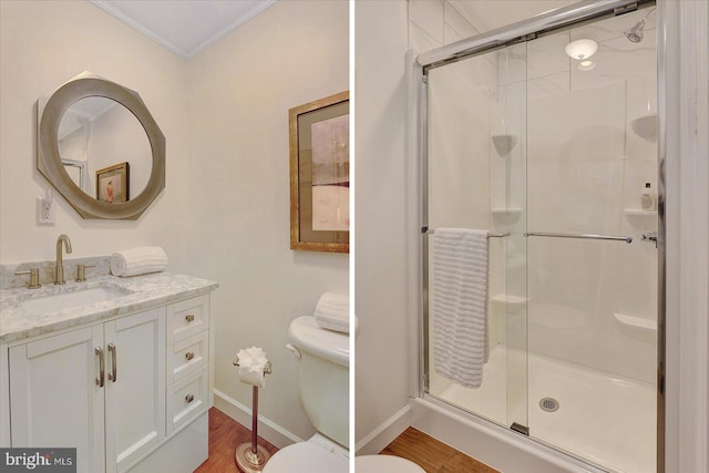 2165 Broadway, Hanover, PA 17331 - bathroom featuring ornamental molding, a stall shower, vanity, and wood finished floors
