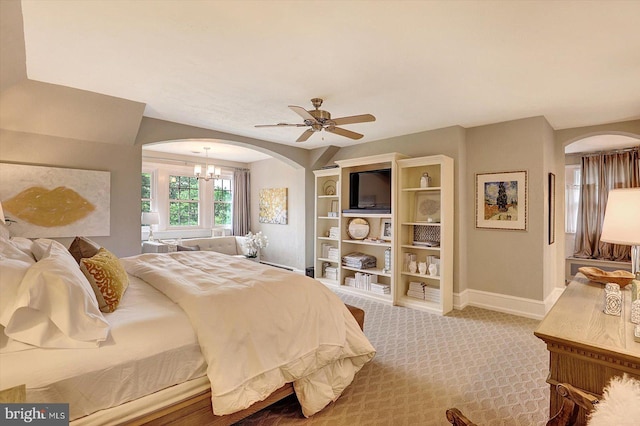 2165 Broadway, Hanover, PA 17331 - bedroom with arched walkways, a chandelier, carpet, and ceiling fan