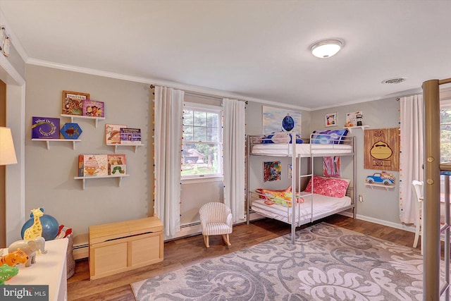 2165 Broadway, Hanover, PA 17331 - bedroom featuring crown molding, wood finished floors, and a baseboard radiator