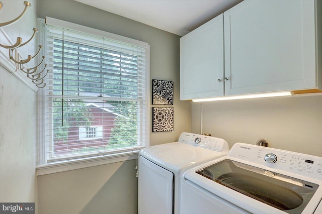 2165 Broadway, Hanover, PA 17331 - washroom with cabinet space, washer and clothes dryer, and healthy amount of natural light