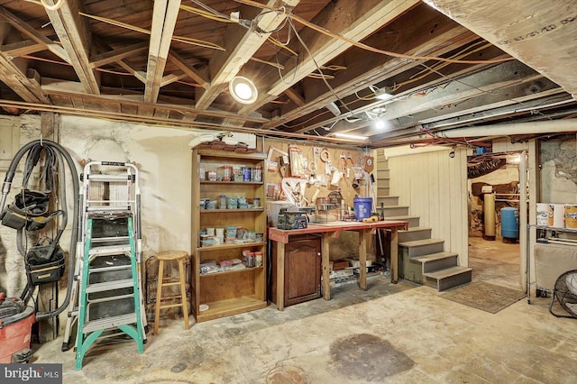 2165 Broadway, Hanover, PA 17331 - unfinished below grade area with a workshop area, stairway, and a water pressure tank