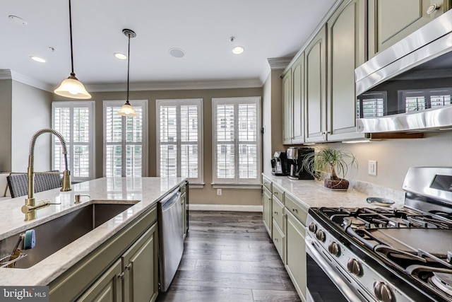 508 Rampart Way Unit 6, Oxon Hill, MD 20745 - kitchen featuring appliances with stainless steel finishes, crown molding, dark wood-style flooring, light stone counters, and hanging light fixtures