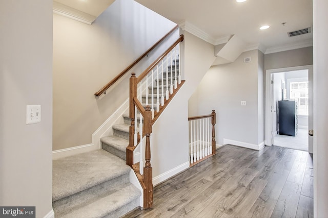 508 Rampart Way Unit 6, Oxon Hill, MD 20745 - stairs featuring ornamental molding, wood finished floors, and recessed lighting