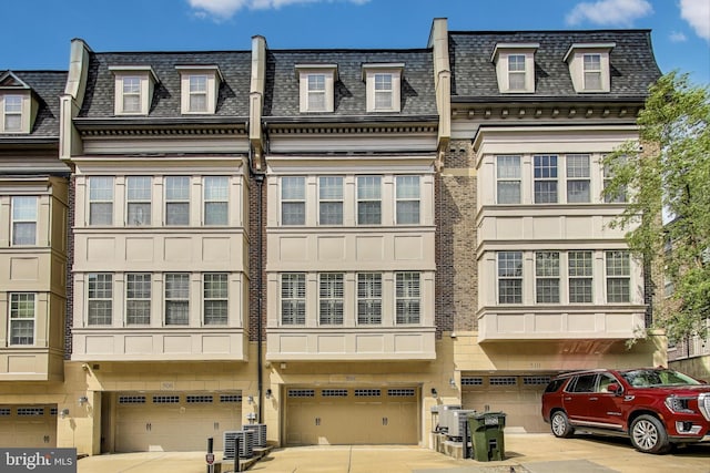 508 Rampart Way Unit 6, Oxon Hill, MD 20745 - view of building exterior featuring a garage and driveway
