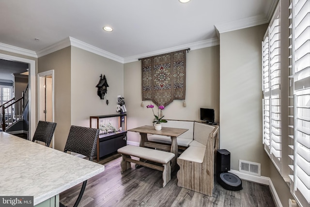 508 Rampart Way Unit 6, Oxon Hill, MD 20745 - dining room with wood finished floors, ornamental molding, stairs, and recessed lighting