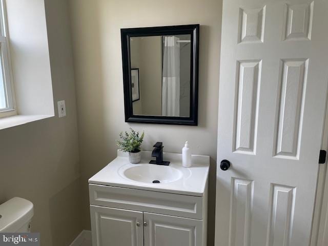 924 N Belnord Ave, Baltimore, MD 21205 - bathroom with vanity and toilet