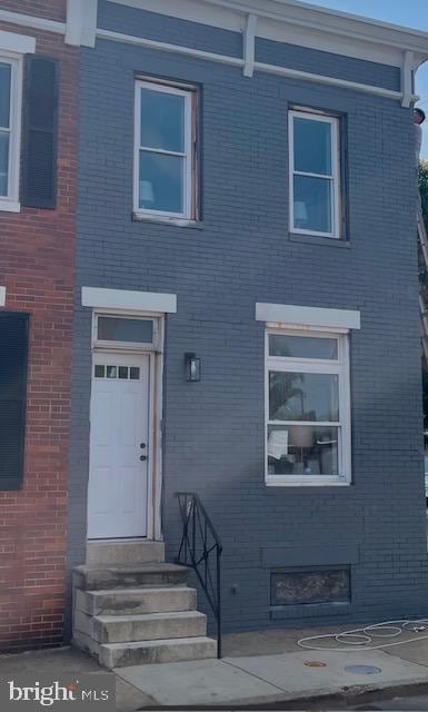 924 N Belnord Ave, Baltimore, MD 21205 - view of front of property with brick siding and entry steps