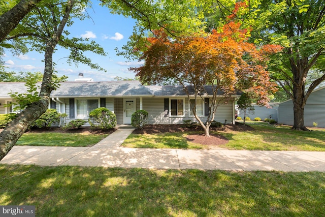 14627 Deerhurst Ter Unit 214-A, Silver Spring, MD 20906 - view of front facade with a front yard