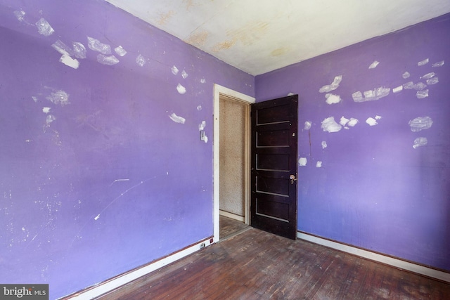 977 N 23rd St, Camden, NJ 08105 - unfurnished room with wood finished floors and baseboards