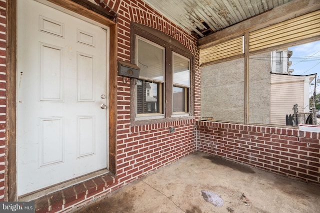 977 N 23rd St, Camden, NJ 08105 - property entrance with brick siding and a porch