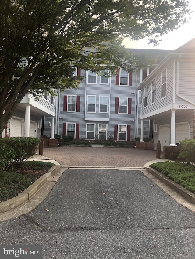 5003 Hollington Dr Unit 305, Owings Mills, MD 21117 - view of front of house featuring a garage
