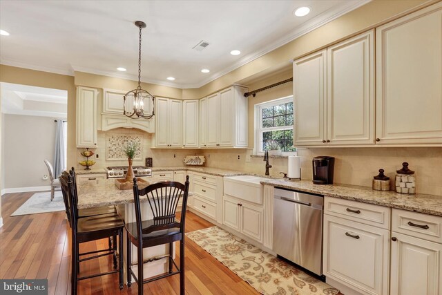 3930 Liz Cir, Doylestown, PA 18902 - kitchen featuring stainless steel dishwasher, light stone countertops, light wood-type flooring, tasteful backsplash, and ornamental molding