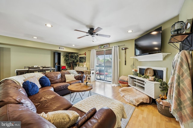 3750 Clarendon Ave Unit 5, Philadelphia, PA 19114 - living room featuring wood finished floors, a ceiling fan, recessed lighting, and a fireplace