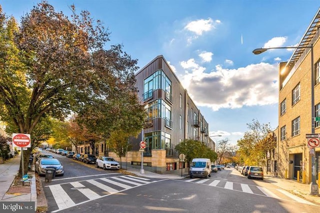 1700 Kalorama Rd NW Unit 310, Washington, DC 20009 - view of asphalt road with traffic signs, sidewalks, and street lighting