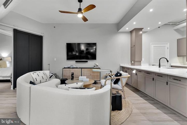 1700 Kalorama Rd NW Unit 310, Washington, DC 20009 - living room featuring light wood finished floors, ceiling fan, and recessed lighting
