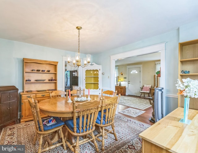 120 W Seventh St Unit 150, Media, PA 19063 - dining area featuring a chandelier and wood finished floors