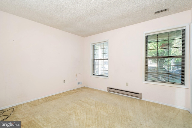 30 Hilltop Ln W, Columbus, NJ 08022 - carpeted spare room with a baseboard radiator and a textured ceiling