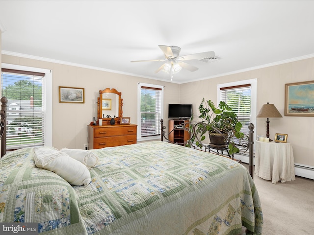 414 S Aurora St, Easton, MD 21601 - carpeted bedroom with crown molding, ceiling fan, and a baseboard radiator