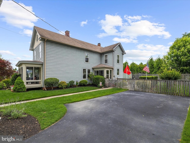 414 S Aurora St, Easton, MD 21601 - view of property exterior featuring a chimney