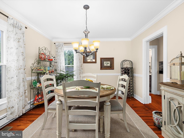414 S Aurora St, Easton, MD 21601 - dining space featuring a chandelier, wood finished floors, and crown molding