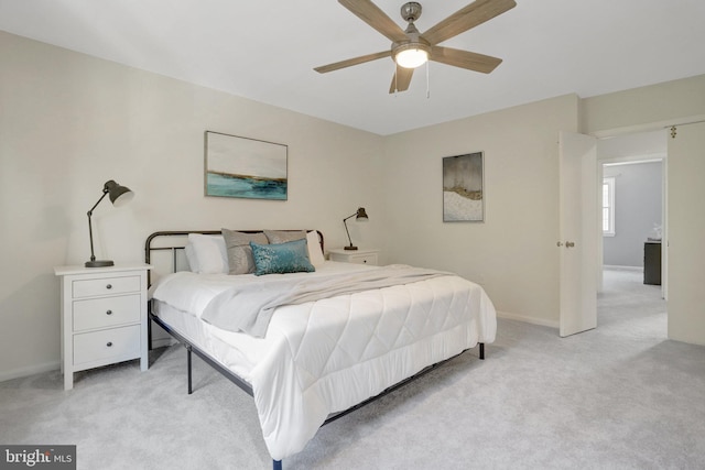 8108 Rhodell Ln, Springfield, VA 22153 - bedroom with light carpet and a ceiling fan