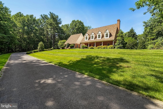 2647 Shepperd Rd, Monkton, MD 21111 - cape cod home with a chimney, a front lawn, and a forest view