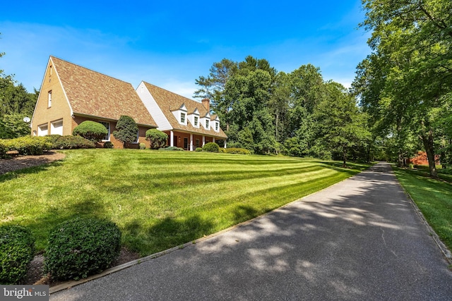 2647 Shepperd Rd, Monkton, MD 21111 - view of front facade with a front yard, a chimney, and a garage