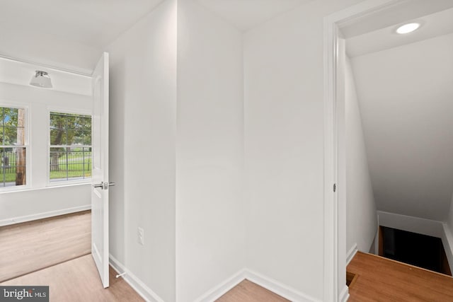 201 Parkway St, Winchester, VA 22601 - corridor with wood finished floors, an upstairs landing, and baseboards