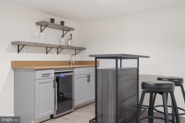 201 Parkway St, Winchester, VA 22601 - indoor wet bar featuring beverage cooler and light wood-style floors