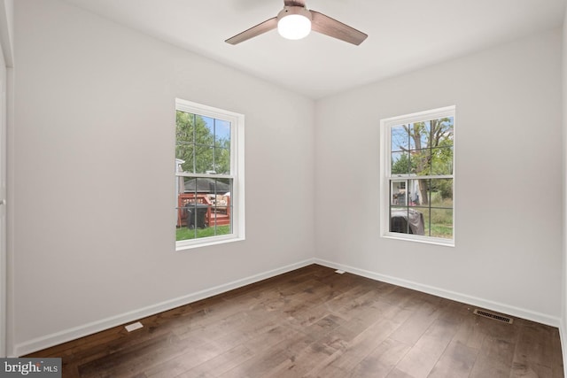 201 Parkway St, Winchester, VA 22601 - unfurnished room with plenty of natural light, hardwood / wood-style floors, a ceiling fan, and baseboards