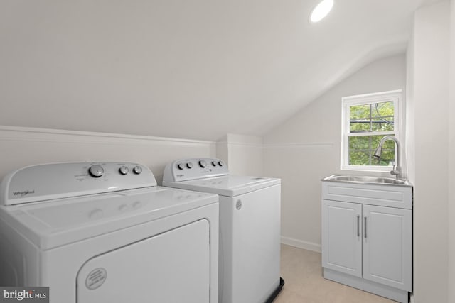 201 Parkway St, Winchester, VA 22601 - washroom featuring independent washer and dryer, cabinet space, and light tile patterned flooring