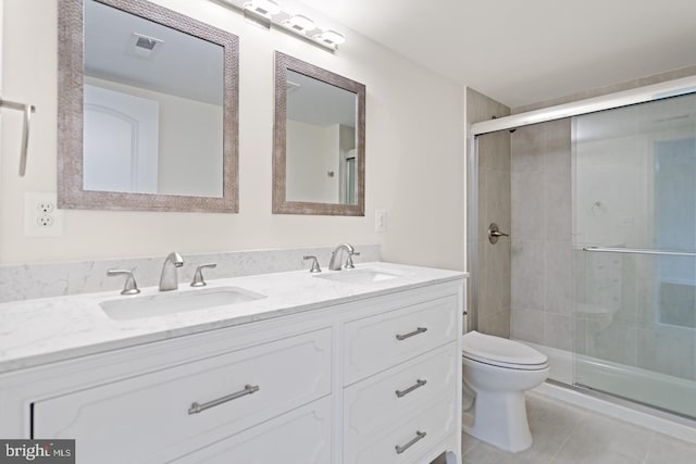 201 Parkway St, Winchester, VA 22601 - full bathroom featuring double vanity, toilet, a stall shower, and tile patterned floors