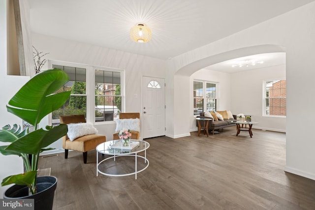 201 Parkway St, Winchester, VA 22601 - foyer featuring arched walkways, baseboards, and wood finished floors
