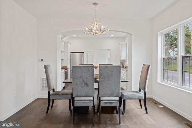 201 Parkway St, Winchester, VA 22601 - dining area with arched walkways, a chandelier, dark wood-style flooring, baseboards, and recessed lighting