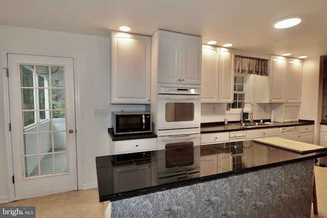 4 W Woodduck Dr, Tuckerton, NJ 08087 - kitchen with white appliances, a sink, dark countertops, white cabinetry, and recessed lighting