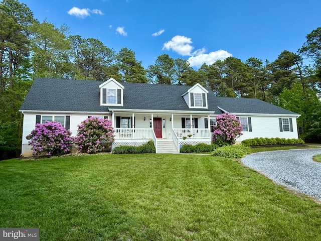 4 W Woodduck Dr, Tuckerton, NJ 08087 - new england style home with covered porch and a front yard