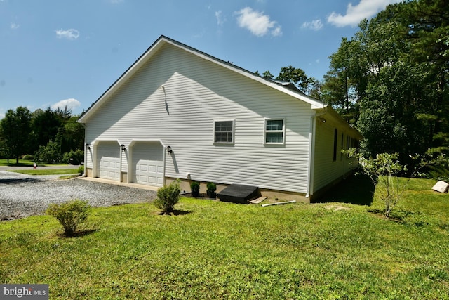 4 W Woodduck Dr, Tuckerton, NJ 08087 - view of side of property with a lawn and a garage