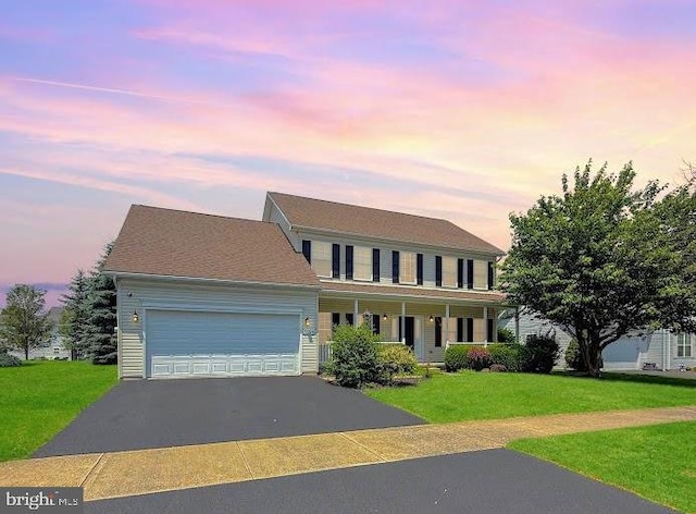 1994 Country Glenn Ln, State College, PA 16801 - view of front of property with asphalt driveway, an attached garage, a yard, and covered porch